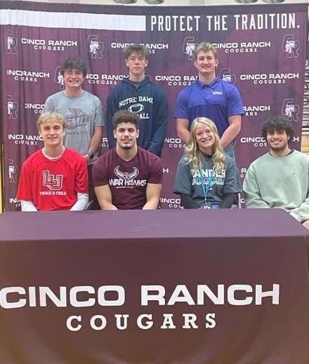 Cinco Ranch student-athletes celebrate after signing a national letter of inter to play a sport in college.